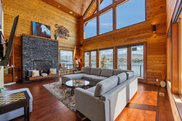Large Open Living Area with Modern Stone Gas Fireplace